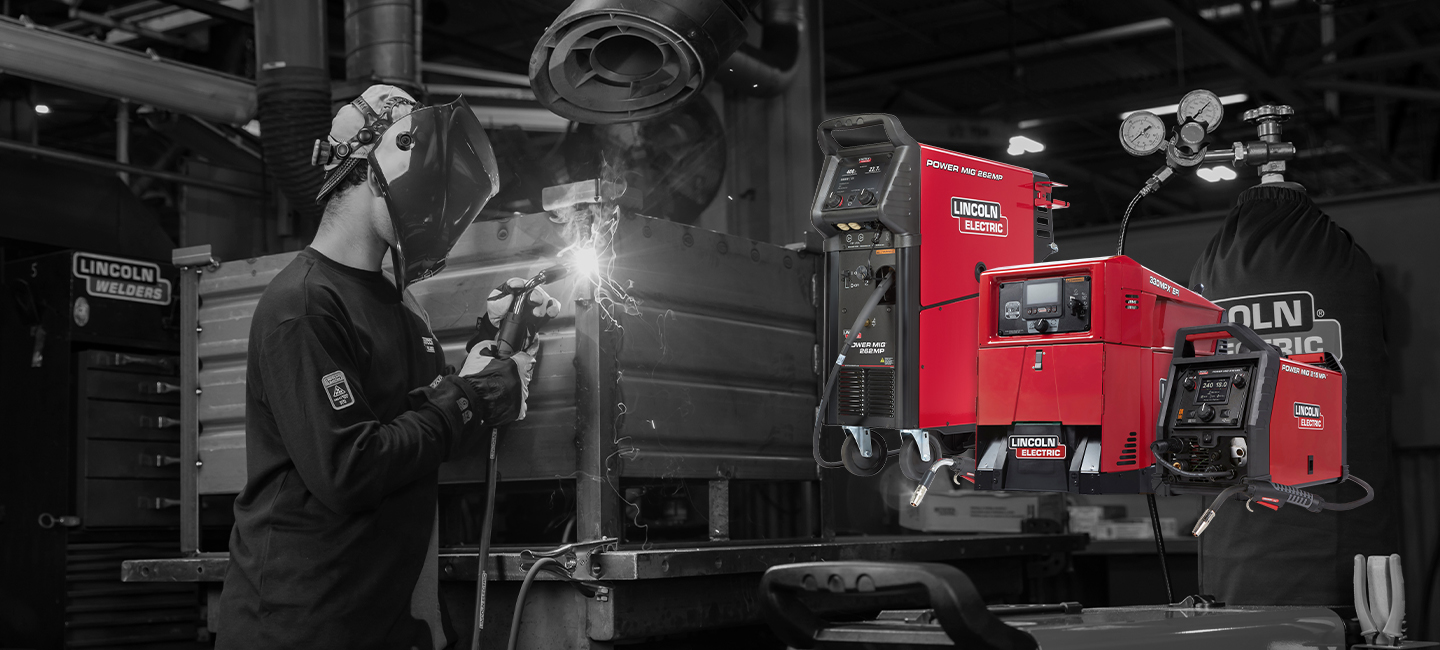 Lincoln Electric welding machines pictured alongside a welder in an industrial workshop